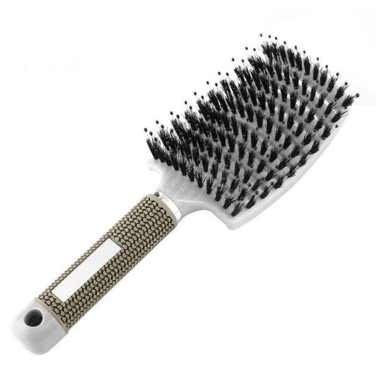 Brosse démêlante réduit la chute de cheveux