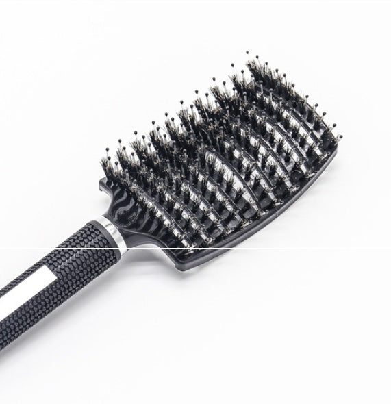 Brosse démêlante réduit la chute de cheveux