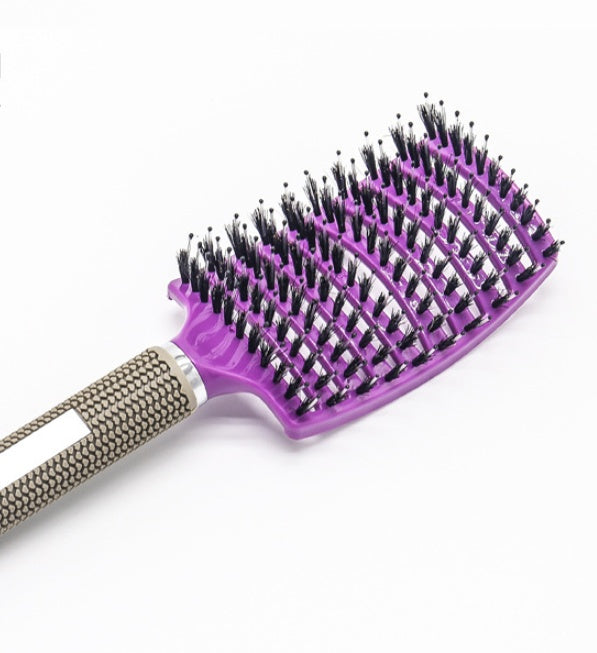 Brosse démêlante réduit la chute de cheveux